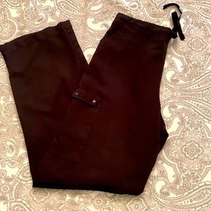 Black Scrubs with side pockets by:Spread good cheer! Size small